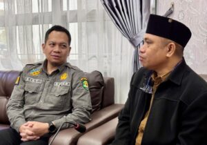 Kepala DPPKB Kutim, Achmad Junaidi (Kanan) bersama Kepala Perwakilan BKKBN Kaltim, Nurizky Permanajati. (dok:ist)