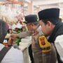 Satuan Tugas (Satgas) Pangan Polresta Samarinda, bersama Wakapolresta, saat melakukan Inspeksi Mendadak di Pasar Baqa, Samarinda Seberang, Rabu (12/3/2025) (Dok: ali/katakaltim)