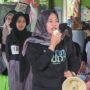 Pembina Kutim Muda Inovatif, Jusmiati saat berada di Sekolah Alam Melawan (dok: caca/katakaltim)